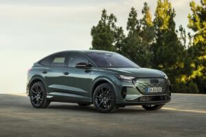 Sage green metallic, outdoor static photo, exterior, three-quarter front view